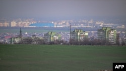 FILE - A photo shows a partial view of Tiraspol (background), in the Transnistria breakaway region, March 1, 2024.