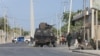 FILE - Security forces patrol the streets following an attack by suspected al-Shabab militants in the Somalia's capital Mogadishu, Feb. 21, 2023.
