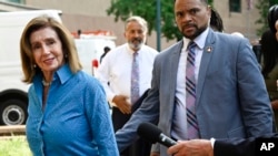 Rep. Nancy Pelosi, D-Calif., the speaker emerita, left, arrives at the Democratic National Headquarters in Washington to discuss President Joe Biden running for reelection, July 9, 2024