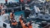 Chinese sailors wield knives, axe in disputed sea clash with Philippines  