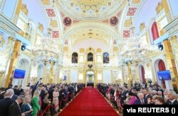 Putin'in yemin ederek beşinci kez resmen göreve başladığı tören Kremlin Sarayı'nda yapıldı.
