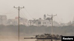 2024年1月11日，以色列南部以色列-加沙邊境附近，以色列坦克從加沙重新進入以色列。