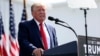 Трамп рече дека гласењето за него ќе ја осигура иднината на автомобилите во Америка
