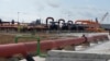 FILE - Oil pipelines, seen during the opening ceremony of Africa’s biggest oil refinery in Lagos, Nigeria, May 22, 2023. 