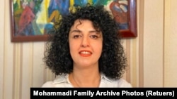 FILE - Iranian women's rights activist Narges Mohammadi, shown in an undated handout photo, was awarded the 2023 Nobel Peace Prize. 