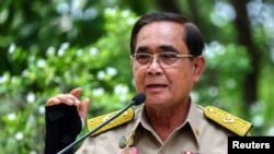 Thailand’s Prime Minister Prayuth Chan-ocha speaks to members of media at the Government House in Bangkok, March 20, 2023.