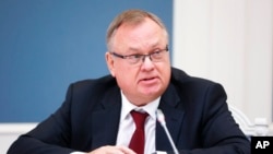 FILE - VTB Bank Chairman Andrei Kostin attends a video call of the VTB Capital "Russia Calling!" Investment Forum in Moscow, Russia, Nov. 30, 2021. (Mikhail Metzel, Sputnik, Kremlin Pool Photo via AP)