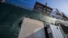 FILE - In this photo reviewed by U.S. military officials, the control tower of Camp VI detention facility is seen on April 17, 2019, at Guantanamo Bay Naval Base, Cuba.