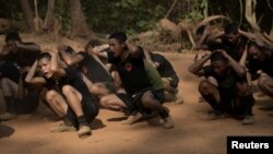 FILE - New recruits of Bamar People's Liberation Army (BPLA) are seen during a training session at a camp in territory belonging to the Karen National Liberation Army (KNLA), in Karen State, Myanmar, March 6, 2024.