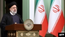 A handout picture provided by the Iranian Presidency shows the Islamic republic's President Ebrahim Raisi speaking in Tehran, Nov. 6, 2023.