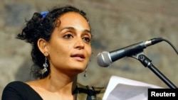 FILE - Author Arundhati Roy speaks in Istanbul, Turkey, June 24, 2005.