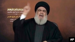 Esta captura de video muestra al líder de Hizbulá, Sayyed Hassan Nasrallah, hablando a través de un enlace en línea durante una manifestación en Beirut, el 3 de noviembre de 2023.