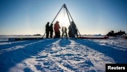 Conducted through the U.S Navy Arctic Submarine Laboratory's biennial Ice Camp, this field test marked IceNode's first in a polar environment. (US NAVY/SCOTT BARNES/Handout via REUTERS)