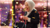Momen ketika Putri Ariani menerima Golden Buzzer dari Simon Cowell yang membuka jalan dia langsung ke final AGT 2023, dalam tangkapan layar.