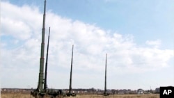 The Palantin-K EW systems are parked during a rehearsal in Voronezh region, Russia. Sept. 19, 2021.(Russian Defense Ministry Press Service via AP)