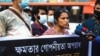 Journalist Saydia Gulrukh Kamal speaks at a protest in May 2021. The journalist says she is harassed and attacked over her reporting. (Credit: Shahidul Islam Sabuj)