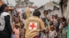 Red Cross officials create awareness of mpox in the Don Bosco refugee camp in Goma, Democratic Republic of the Congo, Aug. 22, 2023.