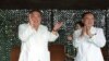 김정은(왼쪽) 북한 국무위원장이 12일 고체연료 대륙간탄도미사일(ICBM) '화성-18형' 시험발사를 현장지도하고 있다. 조선중앙통신이 다음날(13일) 공개한 사진. 