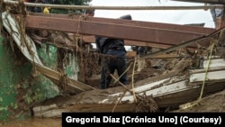 Intensas lluvias causaron inundaciones y deslizamiento de tierra en Las Tejerías, estado Aragua, Venezuela, el sábado, 8 de octubre de 2022.