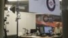 FILE - An anchor of Russian radio station Ekho Moskvy works at the station's office in Moscow, Oct. 23, 2017. 