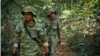 [Joe Patchett – Rainforest Project] មន្ត្រី​ឧទ្យានុរក្ស​នៃ​ប៉ុស្តិ៍​ប្រចាំ​ការ​ស្រុក​ថ្ម​បាំង ដើរ​ល្បាត​ព្រៃ​ជួរ​ភ្នំ​ក្រវាញ​ដើម្បី​ស្វែងរក​សកម្មភាព​កាប់​ឈើ​និង​ប្រមាញ់​ខុស​ច្បាប់។ ក្រុម​មន្ត្រី​ឧទ្យានុរក្ស​មួយ​ក្រុម​នេះ​ទទួល​បន្ទុក​កិច្ចការ​ការពារ​ព្រៃឈើ