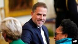 FILE - Hunter Biden arrives in the East Room at the White House in Washington, July 7, 2022.