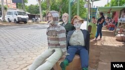 Un grupo de muñecos listos para ser vendidos en comercios en Nicaragua este 30 de diciembre de 2022. 