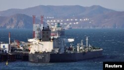 A crude oil tanker is seen anchored at the terminal Kozmino in Nakhodka Bay near the port city of Nakhodka, Russia, Dec. 4, 2022. 