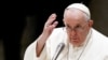 FILE - Pope Francis attends the weekly general audience at the Paul VI Hall at the Vatican, Dec. 14, 2022. 