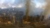 Incêndios em edifícios em Mariupol, Ucrânia, 14 Março 2022