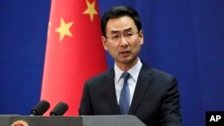 FILE - Chinese Foreign Ministry spokesman Geng Shuang speaks during a daily briefing at the Ministry of Foreign Affairs office in Beijing, Jan. 29, 2019.