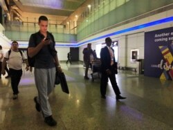 Mariners from the MT Front Altair arrive at Dubai International Airport in Dubai, United Arab Emirates, June 15, 2019, after spending two days in Iran.