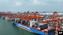 2022年9月13號，一艘中國集裝箱船停泊在廣西欽州港口。
