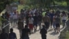 Miles de migrantes se acumulan en pueblo del sur de México