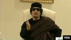 Moammar Gaddafi sesumbar dalam pidatonya bahwa bom NATO tak bisa mengenai dirinya (13/5).