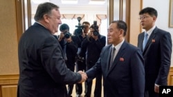 U.S. Secretary of State Mike Pompeo meets with Kim Yong Chol, second from right, a North Korean senior ruling party official and former intelligence chief, for a second day of talks at the Park Hwa Guest House in Pyongyang, North Korea, Saturday, July 7, 2018.