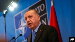 FILE - Turkish President Recep Tayyip Erdogan is set to formally announce the arrest of Abu al-Hassan al-Hashimi al-Qurashi and share additional details in the coming days.