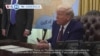 VOA60 America - Trump signs memorandum calling for reciprocal tariffs on US trading partners