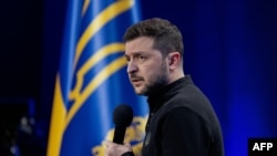 Ukraine's President Volodymyr Zelensky speaks during a joint press conference on the sidelines of the "Ukraine. Year 2025" forum in Kyiv on Feb. 23, 2025, 