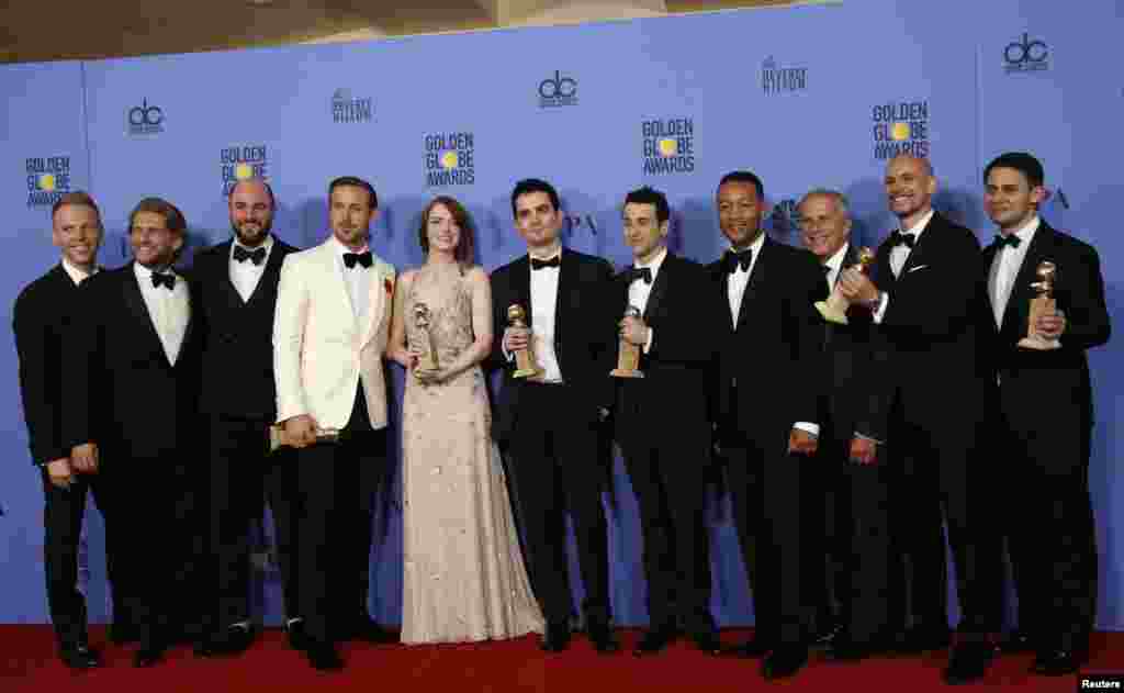 The cast and crew of "La La Land" pose after winning the award for Best Motion Picture - Musical or Comedy among other awards backstage during the 74th Annual Golden Globe Awards in Beverly Hills, CA Jan. 8, 2017.