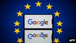 FILE - This picture taken on April 27, 2023, in Toulouse, France, shows a screen displaying the Google logo and the European flag.