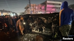 Ostaci vozila nakon napada dronom (Foto: REUTERS/Ahmed Saad)