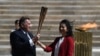 Flame Arrival Faces Calls for Tokyo Olympics be Delayed 