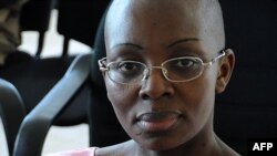 ARCHIVES - Victoire Ingabire, l'opposante rwandaise, le 10 novembre 2011 à la Haute Cour de Kigali. 