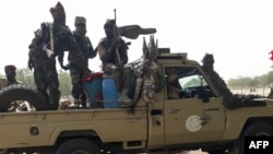 FILE - Chadian soldiers arrive at the Koundoul market, 25 kilometers from N'Djamena, on Jan. 3, 2020, upon their return after a monthslong mission fighting Boko Haram in Nigeria. The military killed scores of Boko Haram fighters in airstrikes on Nov. 8, 2024, the government said.