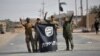 Iran-backed Shi’ite Groups Seek Institutionalized Role in Post-IS Iraq 