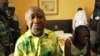 Gbagbo and wife Simone sit in a room at Hotel Golf after they were arrested, Abidjan, April 11, 2011.
