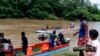 Los migrantes llegan a Lajas Blancas, Darién, Panamá, el sábado 23 de octubre de 2021. Un número creciente de mujeres migrantes han informado haber sufrido abusos sexuales mientras cruzaban la peligrosa jungla del Darién, en la frontera con Colombia, en su ruta hacia EE. UU. 