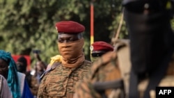 Le capitaine Ibrahim Traore, président du Burkina Faso, lors de la cérémonie du 35e anniversaire de l'assassinat de Thomas Sankaras, à Ouagadougou, le 15 octobre 2022. 