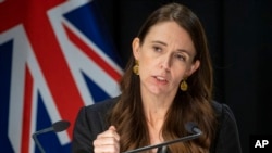 New Zealand Prime Minister Jacinda Ardern gestures during the post-Cabinet press conference in Wellington, New Zealand, Monday, March 7, 2022. (Mark Mitchell/Pool Photo via AP)